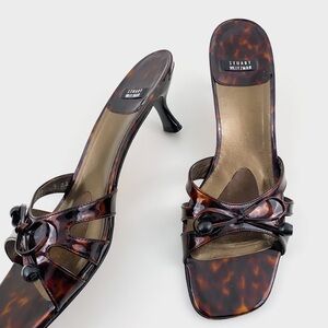 Stuart Weitzman Tortoise Sandals
brown tortoise heels with a square toe   SZ 6.5